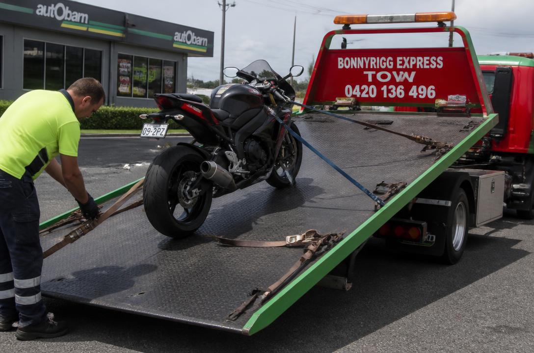 Motorbike being loaded onto the Bonnyrigg Express Tow truck